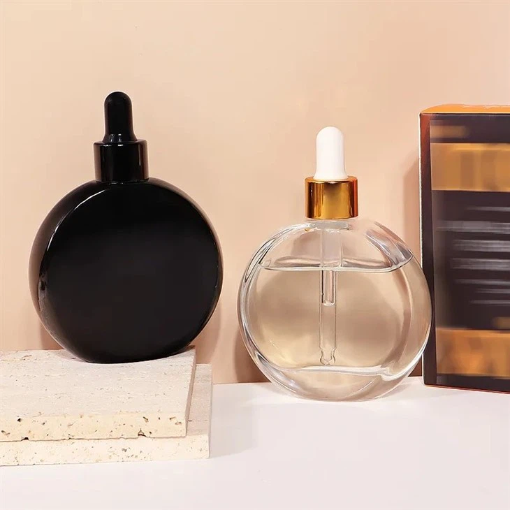 black cosmetic glass perfume bottle